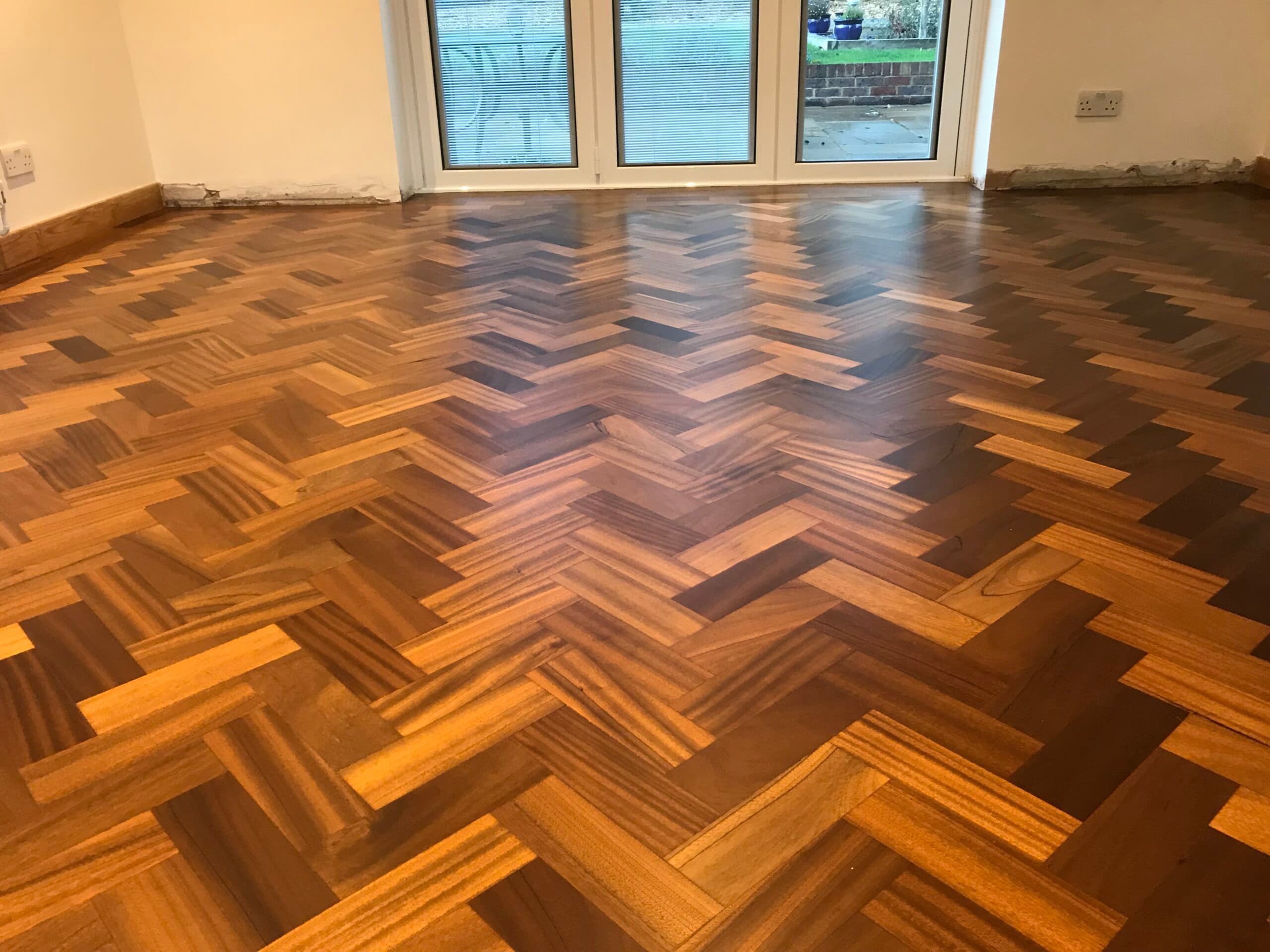 Teak Herringbone flooring sanded and sealed