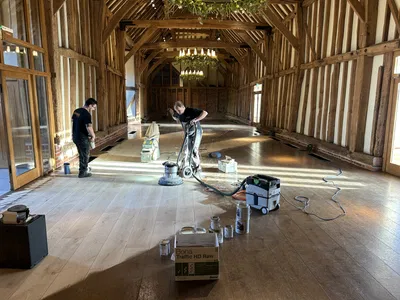 Beautiful Oak flooring restoration in a barn wedding venue in Hertfordshire from Ironwood Flooring Services