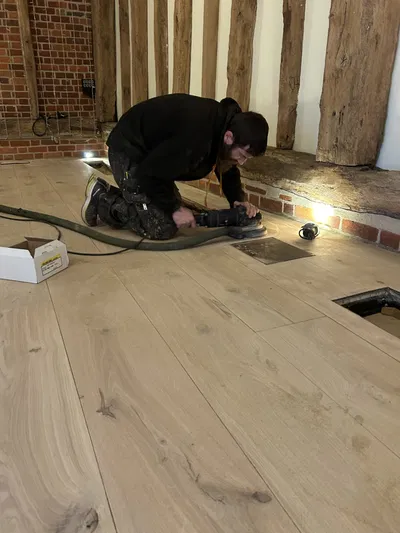 Beautiful Oak flooring restoration in a barn wedding venue in Hertfordshire from Ironwood Flooring Services